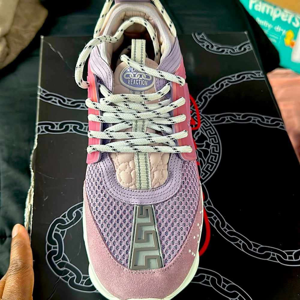 Versace chain reaction